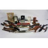 Miscellaneous items, including a group of sheath knives, a cased Pulsar wristwatch and other