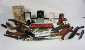 Miscellaneous items, including a group of sheath knives, a cased Pulsar wristwatch and other
