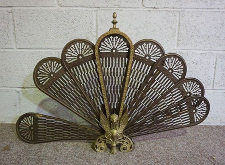A Victorian serpentine brass fretwork fire curb, 140cm long; and brass and iron spark guard (2) - Image 5 of 7