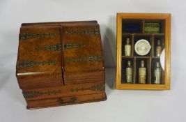 A Victorian walnut stationary box, with arrangement of drawers and compartments, 32cm high, 33cm