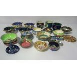A collection of Maling lustre ware, including assorted small jars, trays and similar, decorated with
