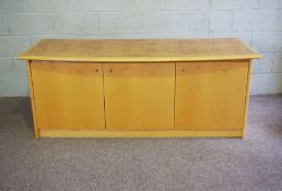A modern bow-front credenza or serving cabinet, by Hands of Wycombe, circa 2000, with a burr