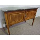 An Edwardian mahogany dressing table, with decorative line inlays, an oval swing mirror and