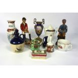 A large collection of assorted ceramics, including blue and white Willow Pattern, assorted