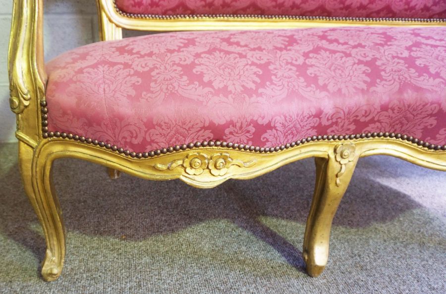 A George III style giltwood framed settee (or Canape), 20th century revival, with an arched - Image 3 of 6