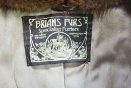 A vintage ladies fur coat and another similar (2)