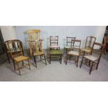 An assortment of ten chairs, including a vintage country style rocking chair; an oak bow framed desk