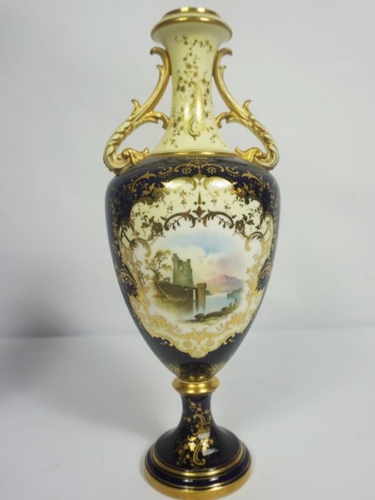 A pair of Coalport porcelain companion vases, each decorated with a lakeside view on a Royal blue - Image 3 of 6