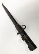 Battle of Britain Interest: A WWII bayonet and leather scabbard, stamped 2592W, 37cm long (this