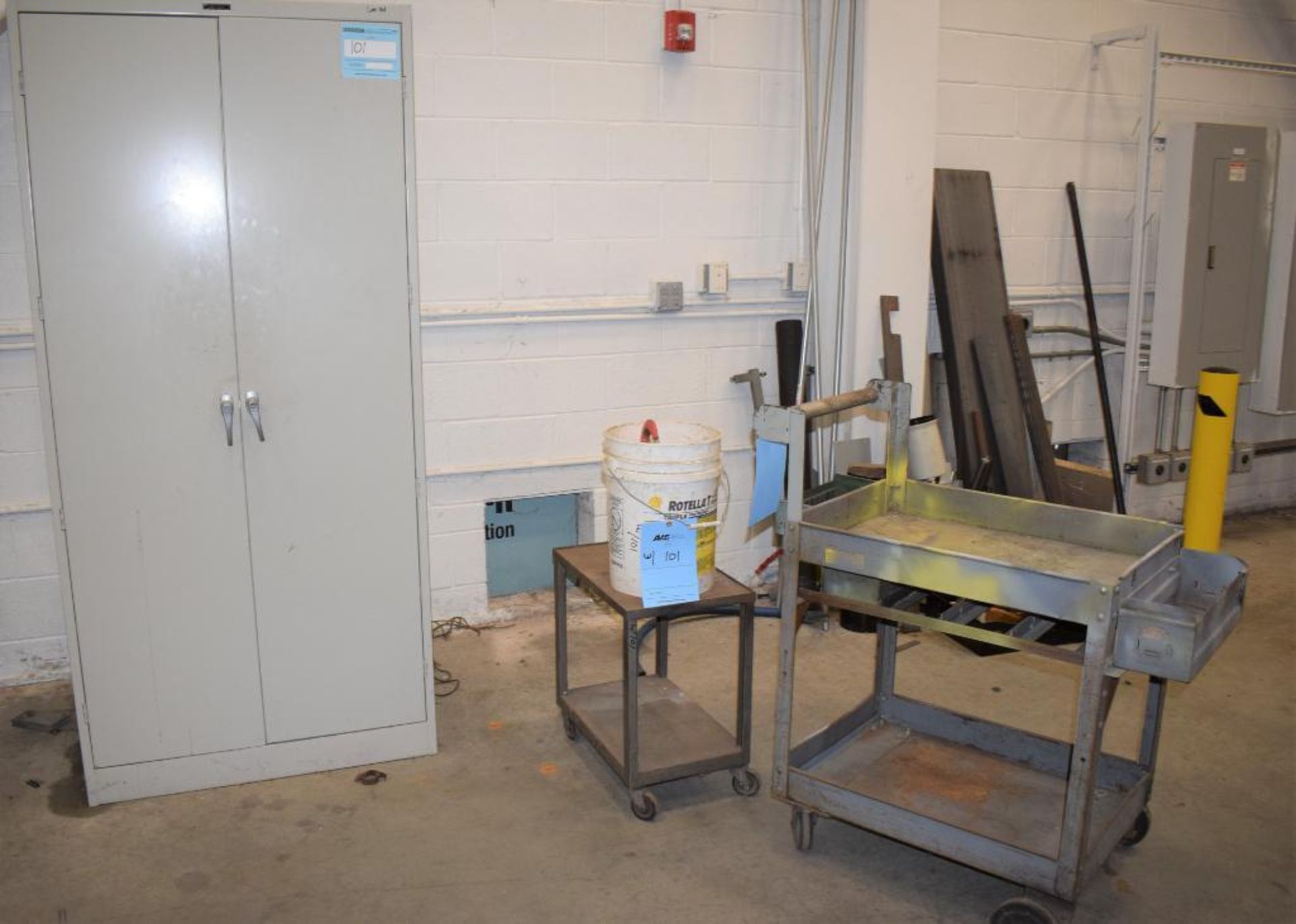 Lot Consisting Of: (1) 2 Door metal cabinets with miscellaneous tools, including saw, batteries, met