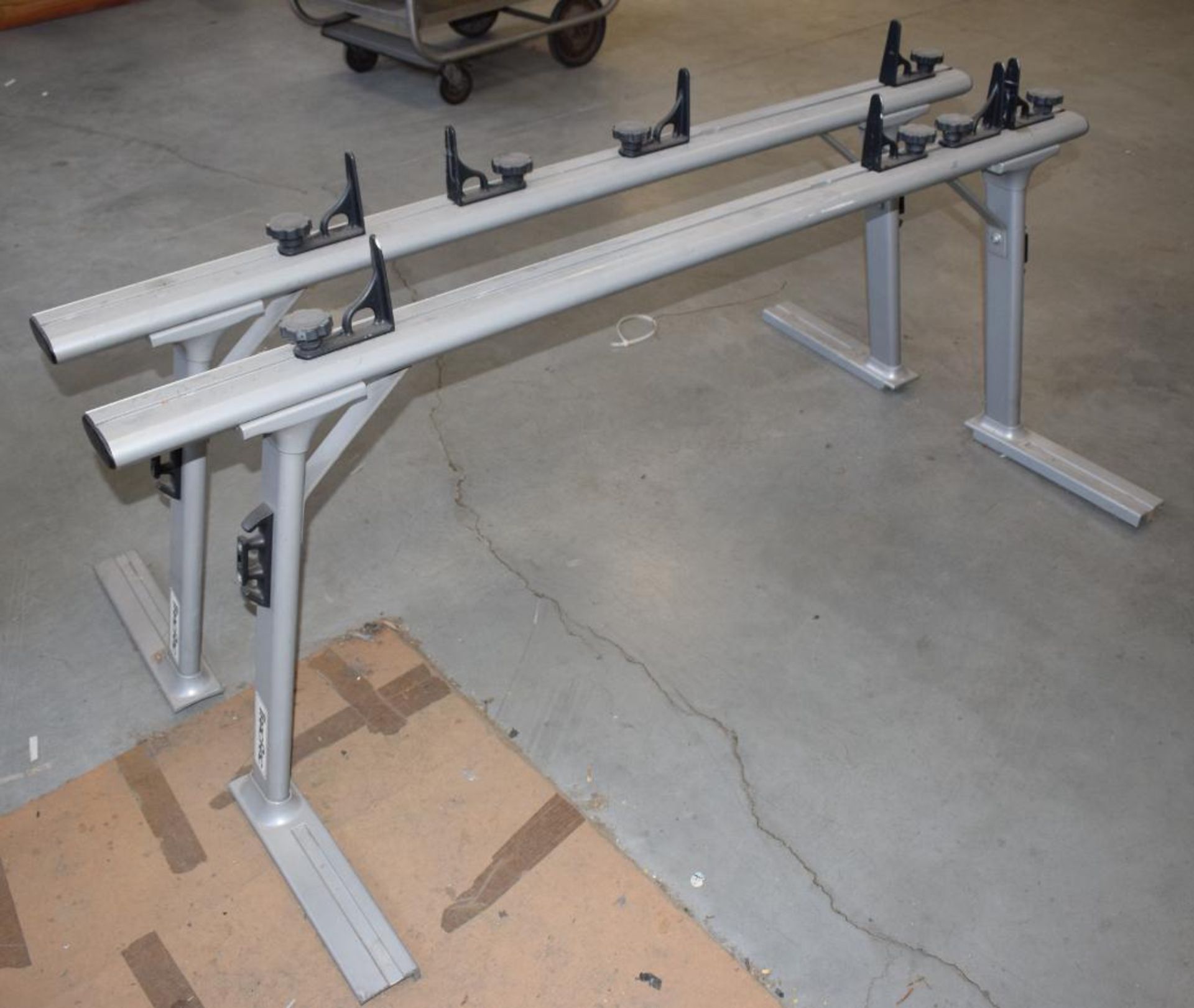 (1) Set Of TracRac Truck Bed Ladder Rack.