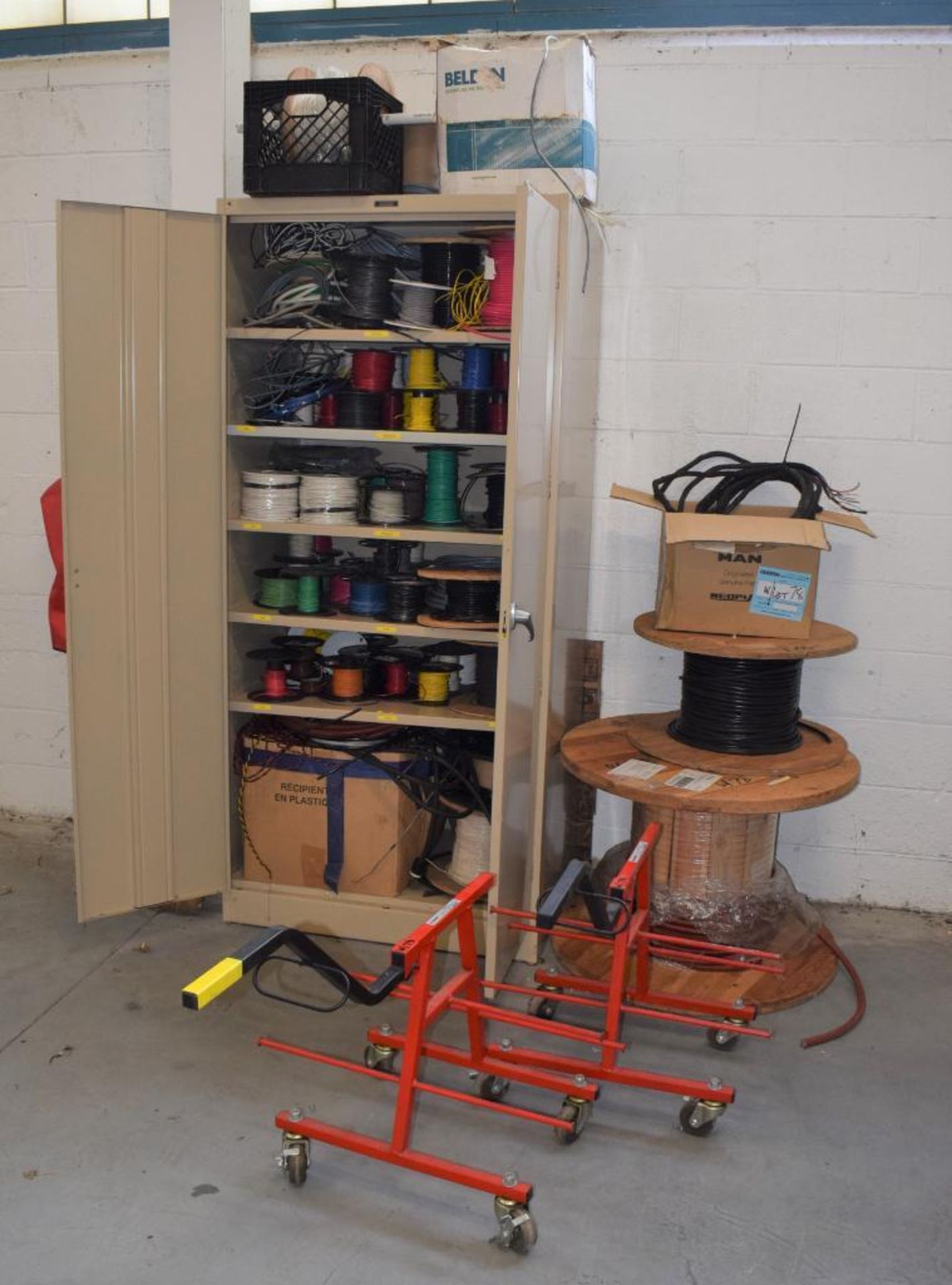 Lot Consisting Of: Miscellaneous Wire Spools, (1) 2 door metal cabinet, (2) wire spool carts.