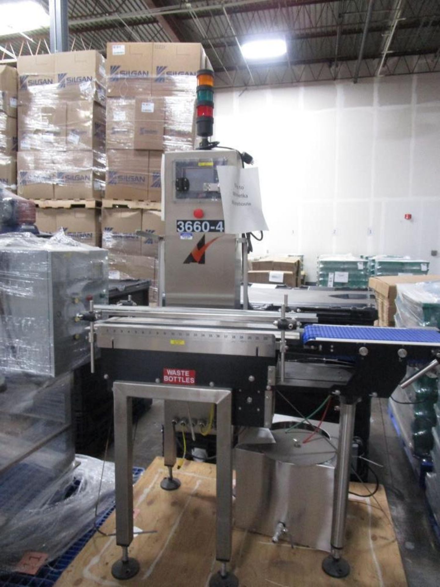 Used-Alpha (All-Fill) Model CW-10 Checkweigher. Capable of speeds up to 300 packages per minute. Can