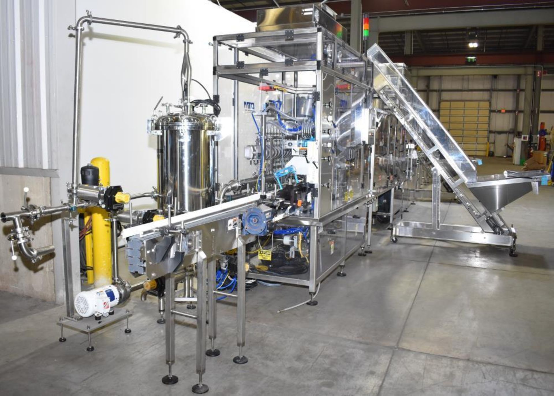 Used- DTM Purefill 2000 Liquid Filling Line with Garvey Feed Table. Pneumatic Scale Model PSC8 plugg - Image 7 of 88