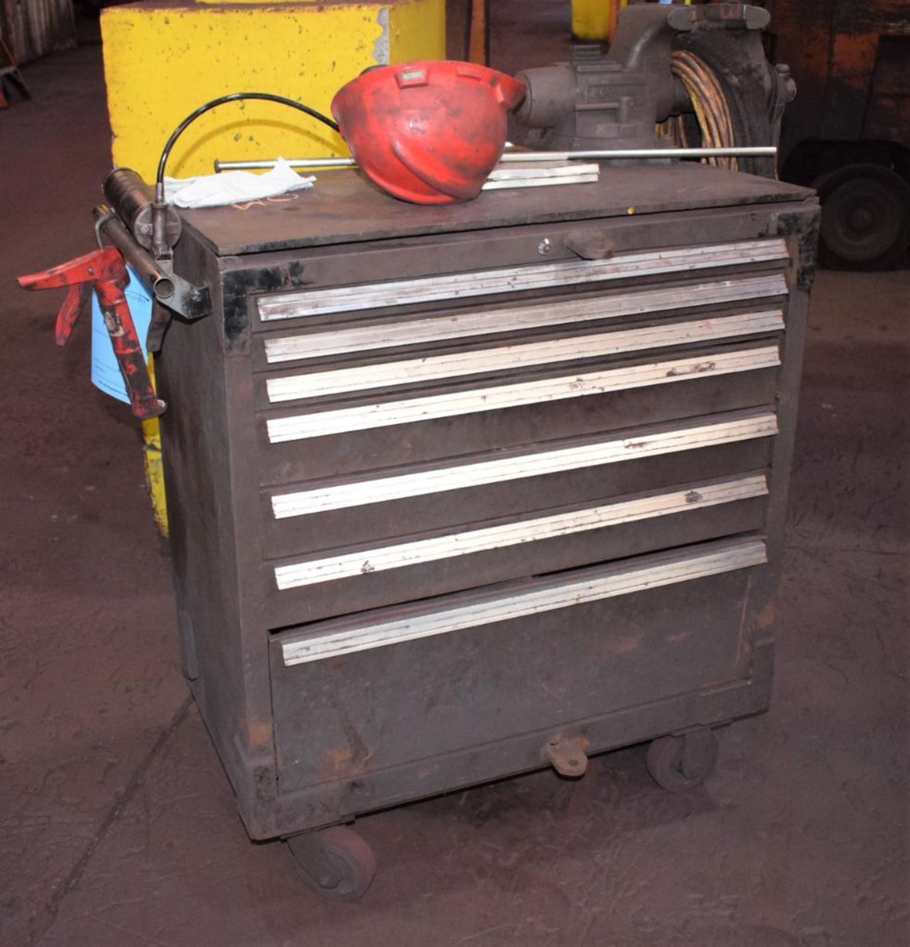 (1) 7 Drawer Rolling Tool Box. With vise & miscellaneous tools.
