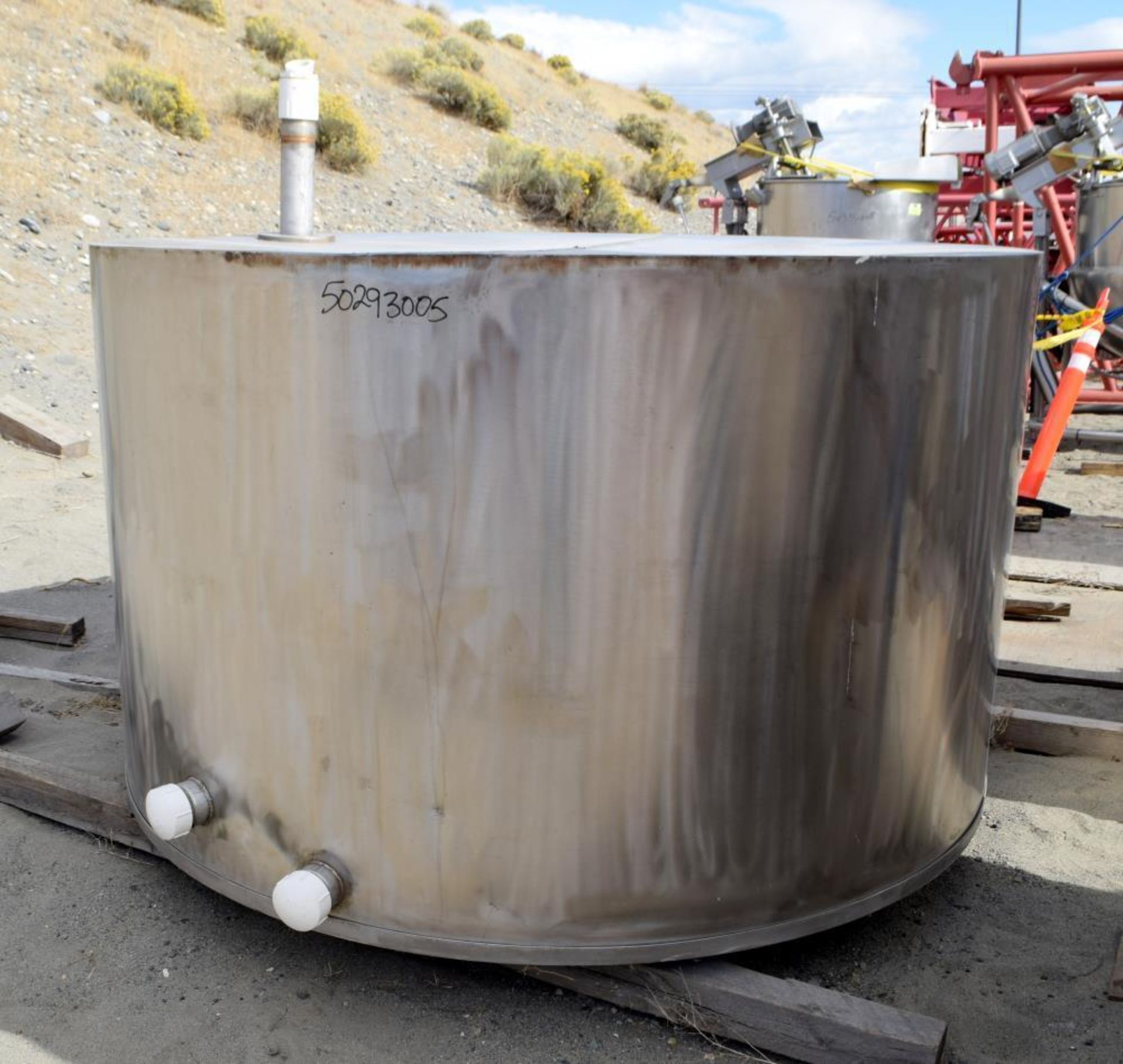 Used- Tank, Approximate 1,000 Gallon, Stainless Steel. Approximate 82" diameter x 48" straight side,