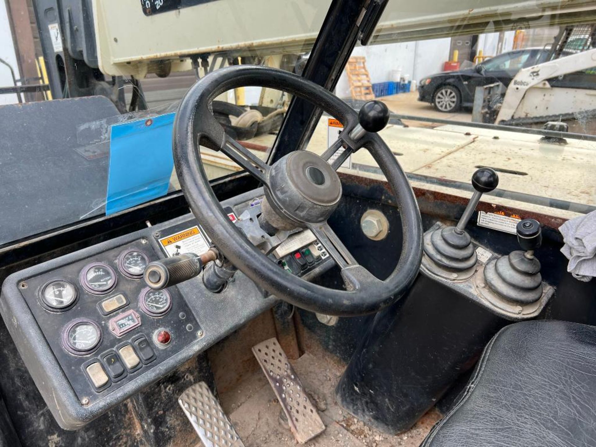 Ingersoll Rand 10,000-LBS. 4x4 Telehandler Forklift Model VR1056 (2003) - Image 11 of 13