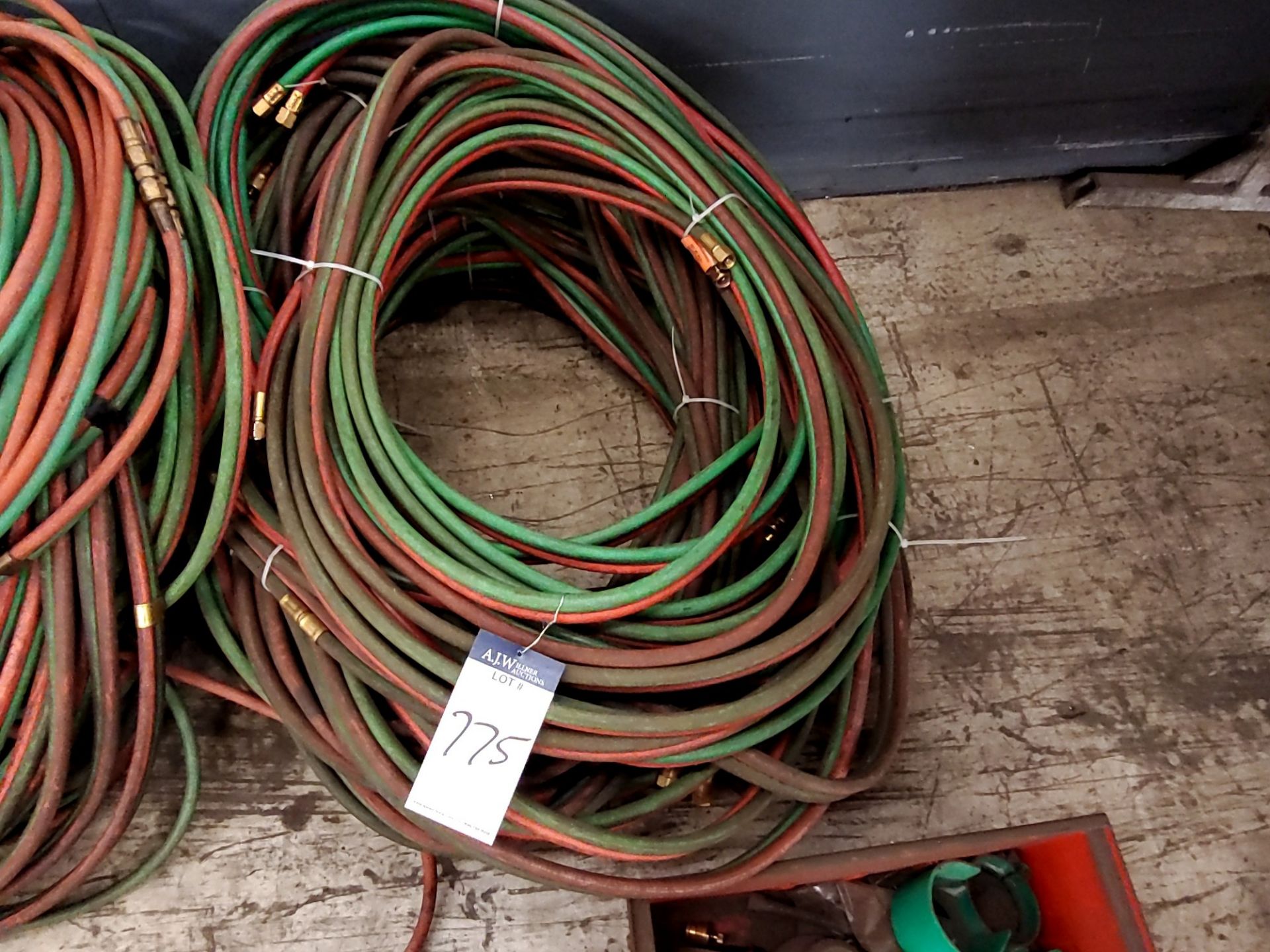 A GROUP OF TORCH WELDING HOSES