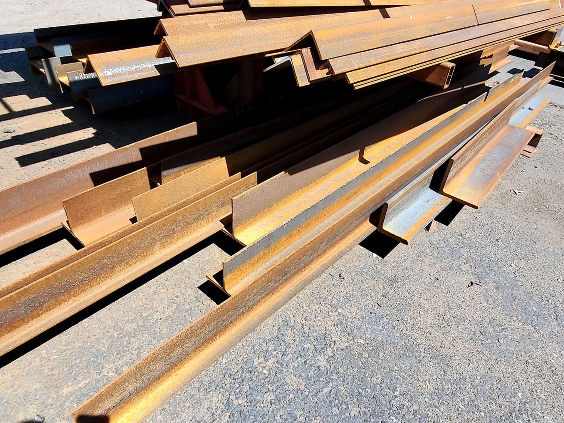 A Group of Ass't Size Steel Angle Iron, U-Channel Beams, T Beams, and Mountable Ladders on Rack - Image 3 of 3