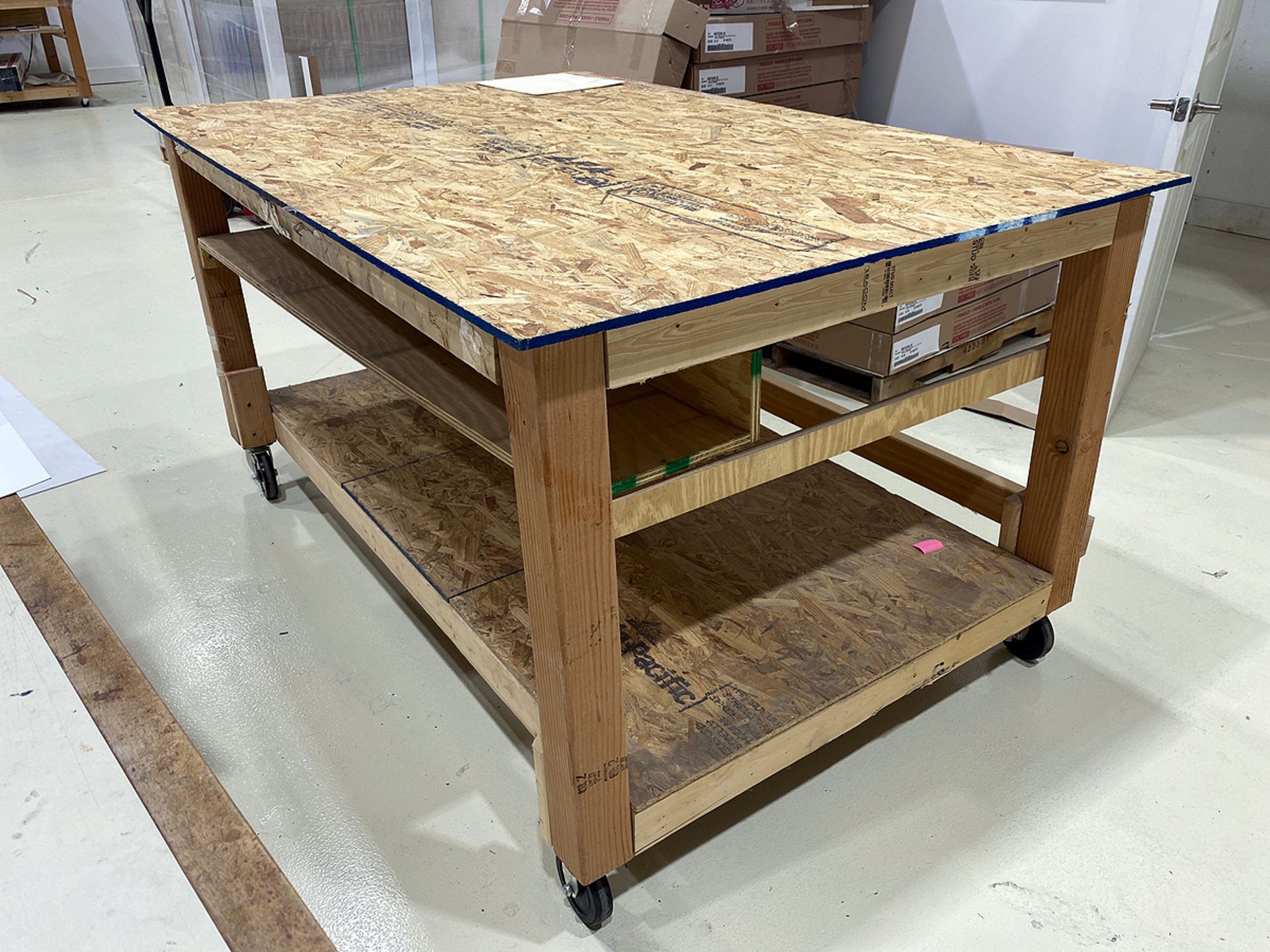 A Group of (2) 3-Tier Rolling Custom Wood Work Tables on Casters