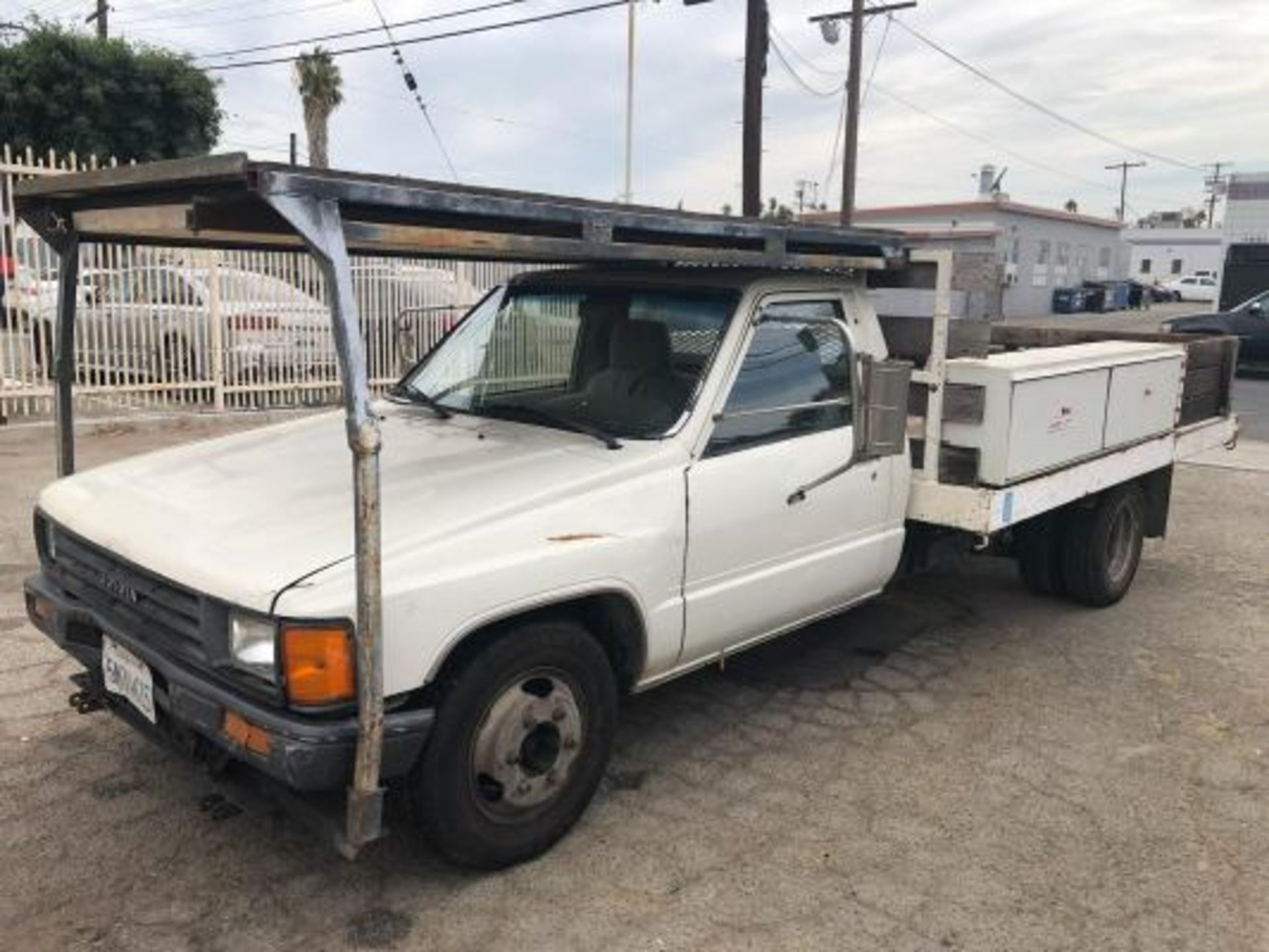 Toyota 9' Stake Bed Truck Lisc# 5M74615 w/ Gas Engine, Manual Trans, Dual Rear Wheels, 173,859 Miles