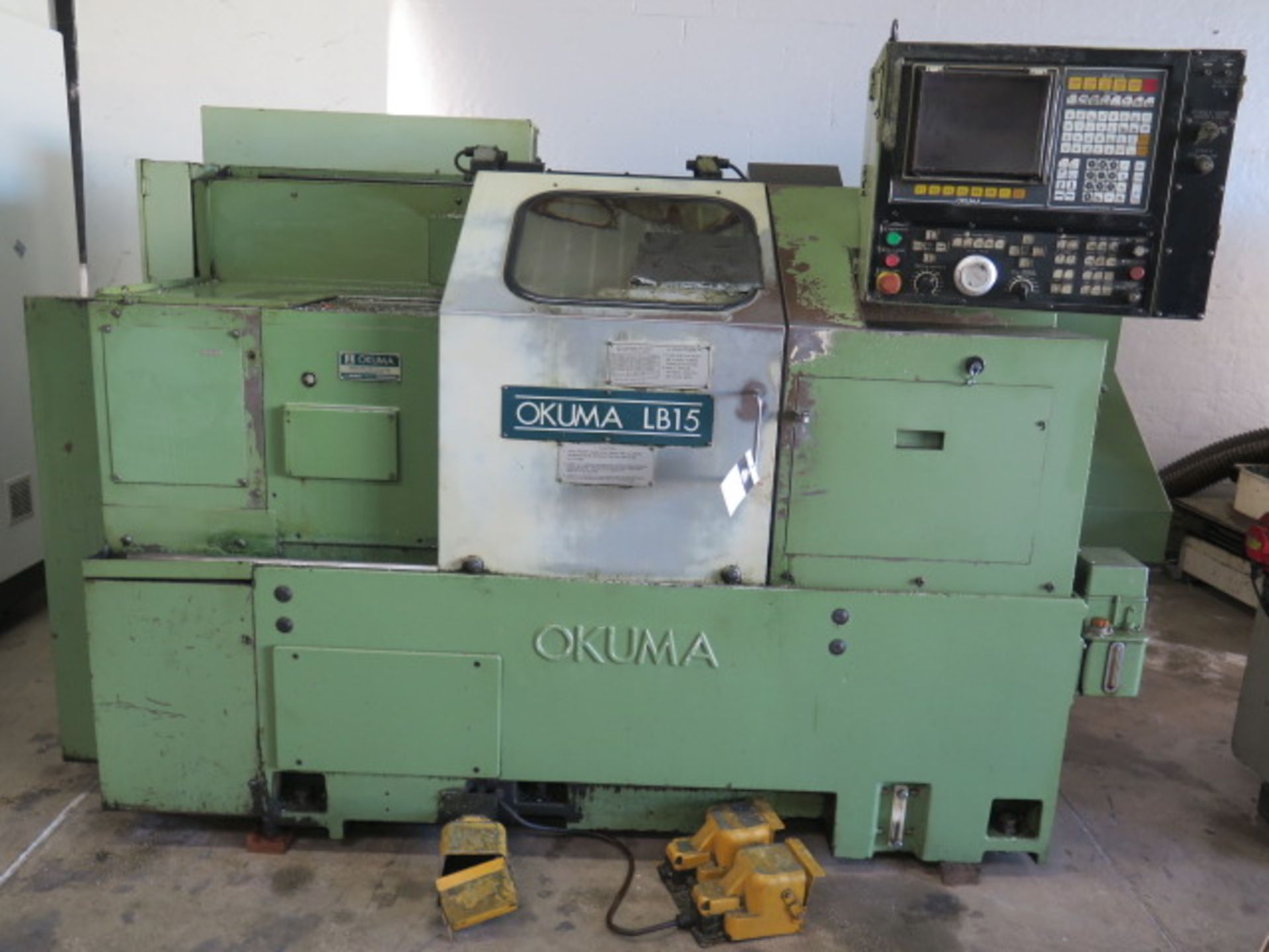 Okuma LB15 CNC Turning Center s/n 9282 w/ OSP5000 L-G Controls, 12-Station Turret, SOLD AS IS