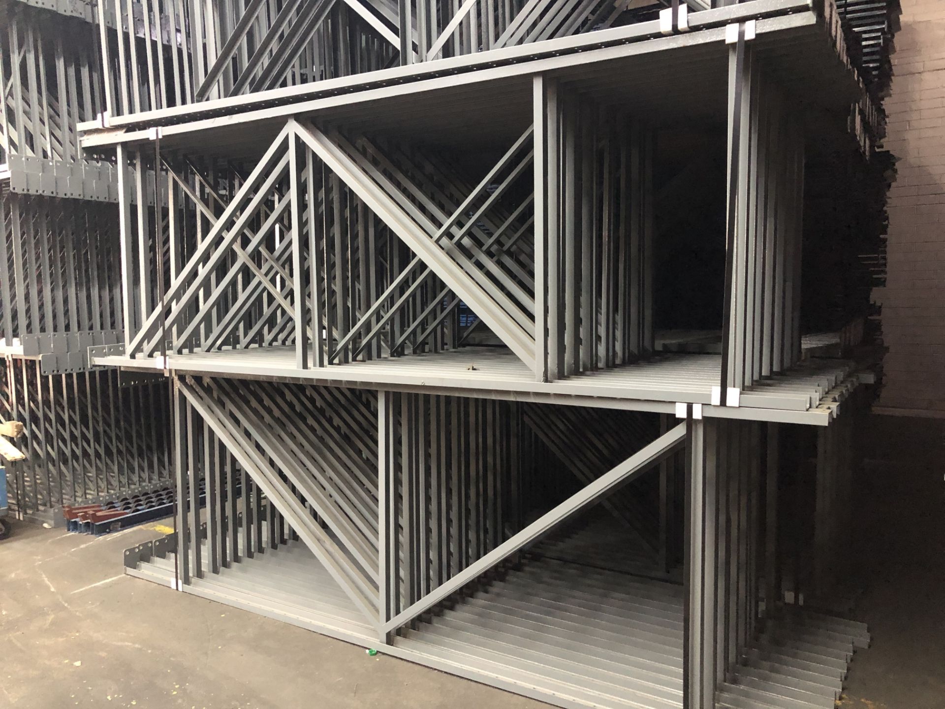 14 BAYS OF 10.5'H X 42"D X 93"L STRUCTURAL STYLE PALLET RACKS