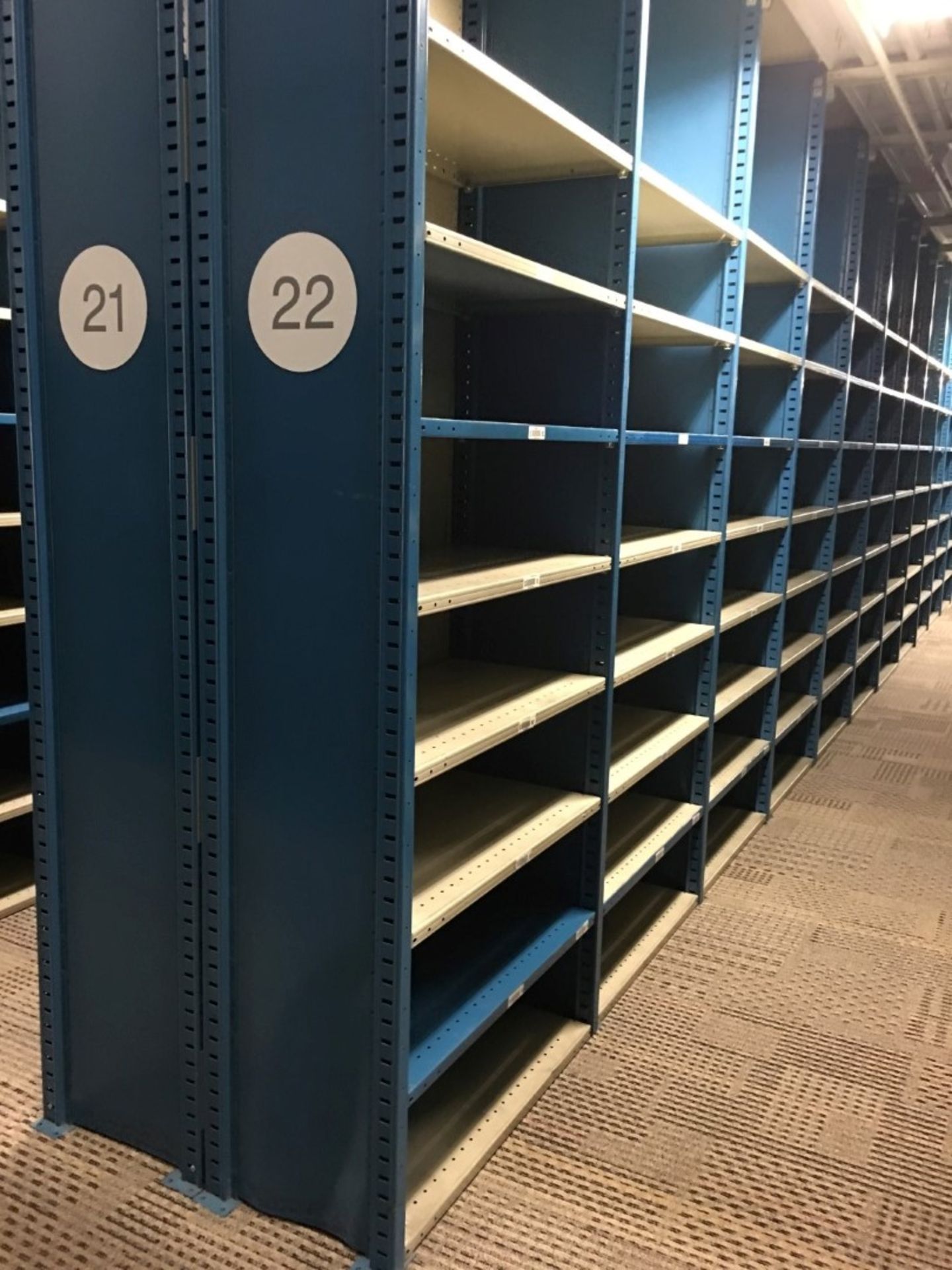 25 SECTIONS OF HALLOWELL H-POST CLOSED BACK SHELVING