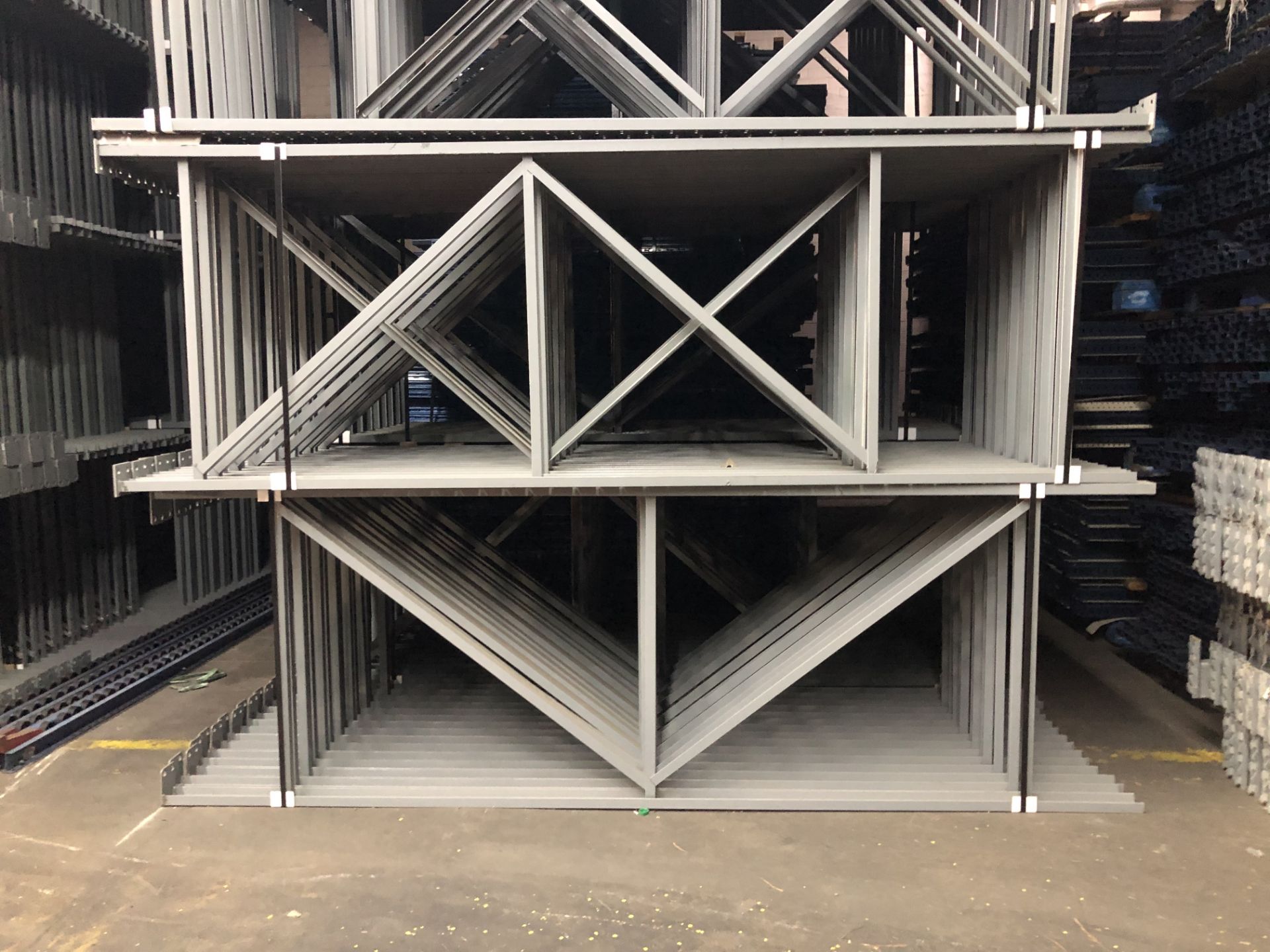 14 BAYS OF 10.5'H X 42"D X 102"L STRUCTURAL STYLE PALLET RACKS