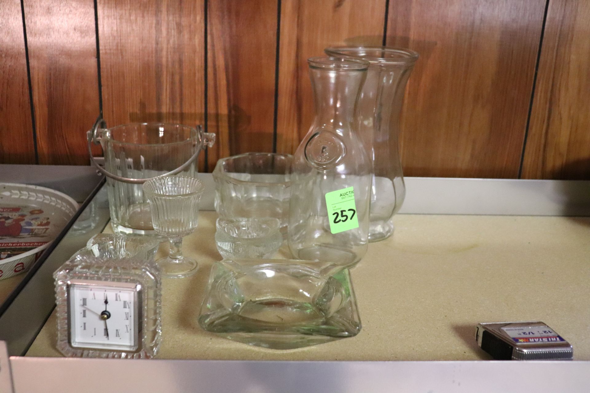 Miscellaneous glassware including milk bottles, ice bucket, ashtray and clock