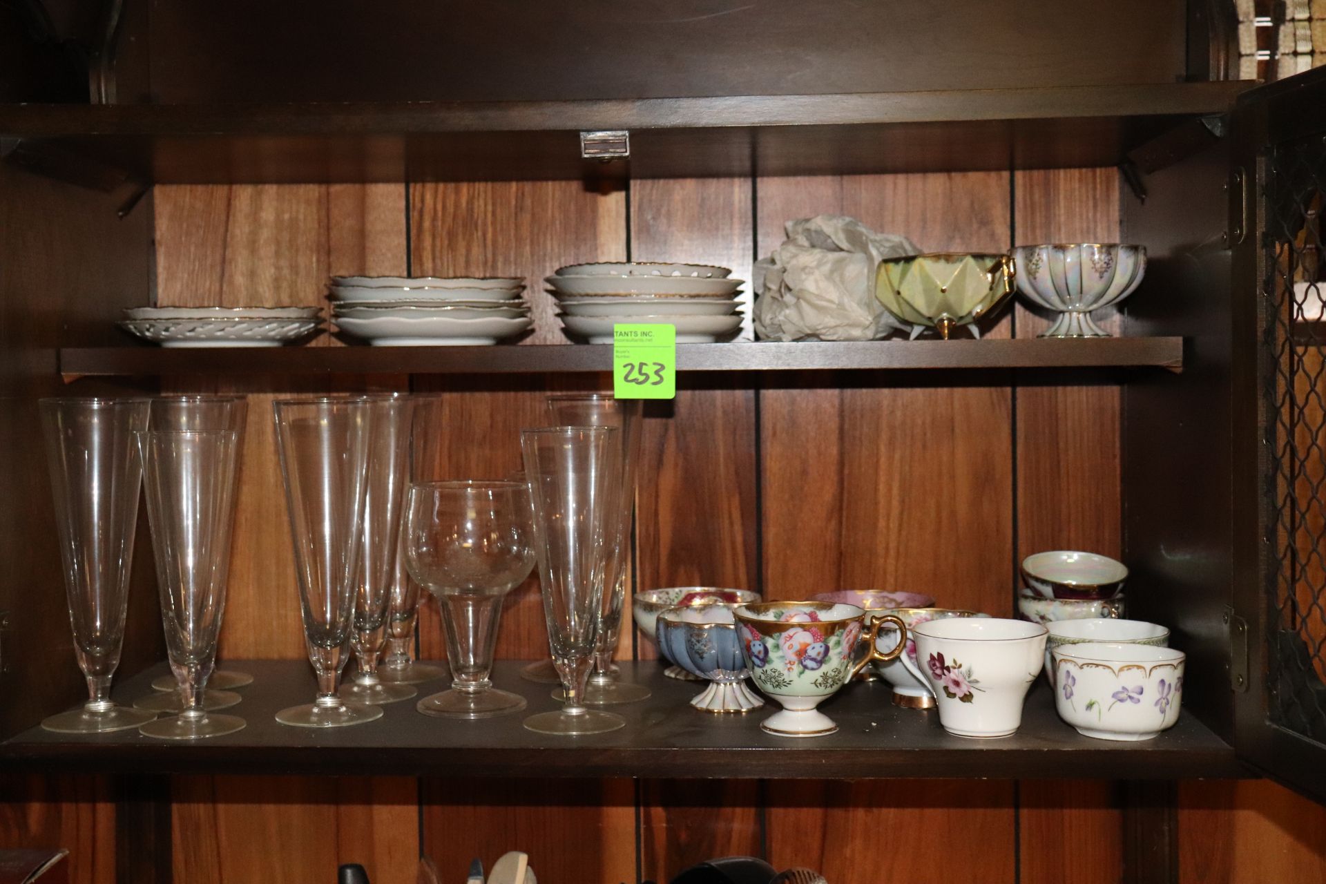 Group of teacups, saucers, and glasses