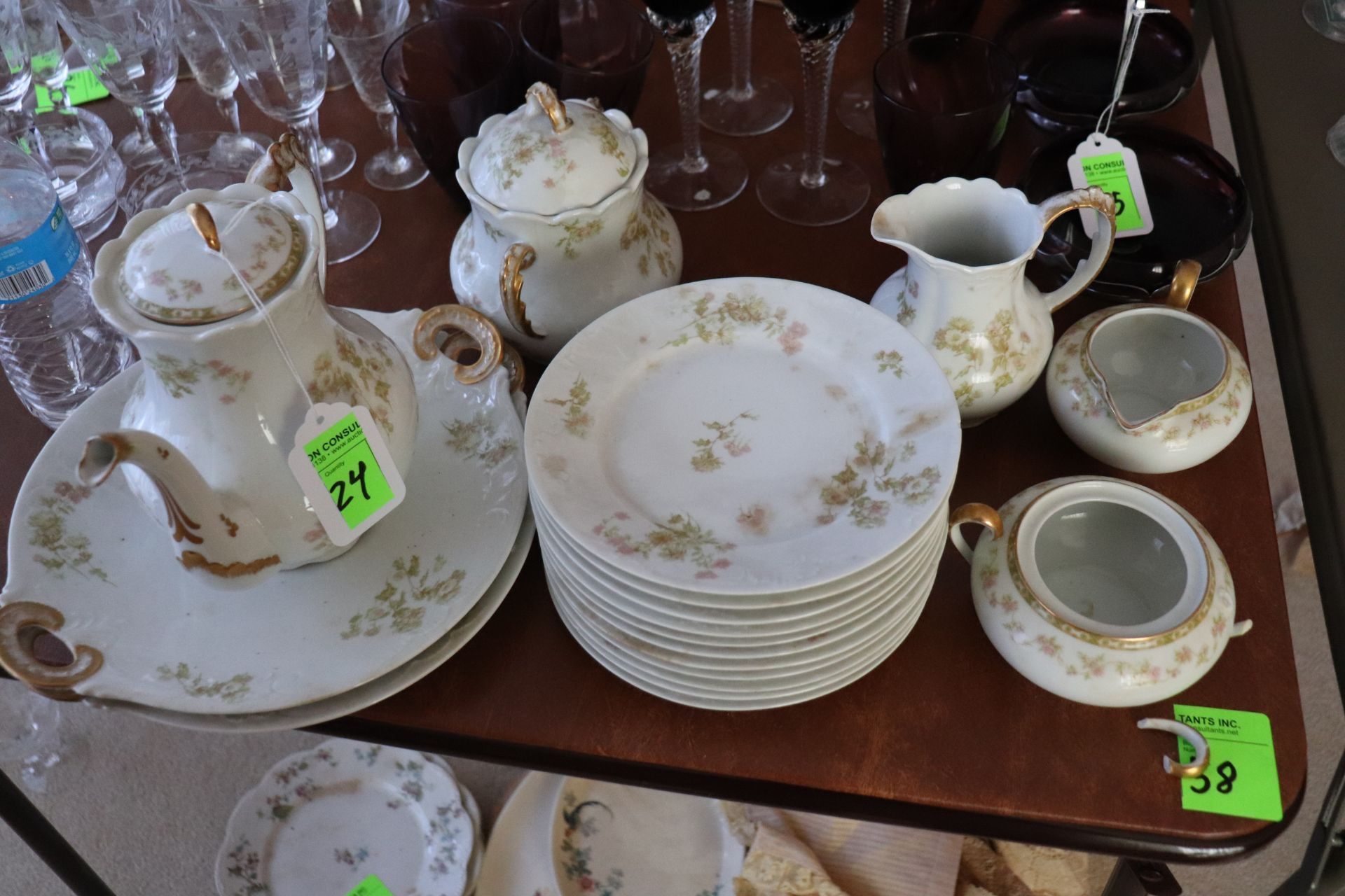 Limoges porcelain tea set with floral decoration (gold paint is worn)