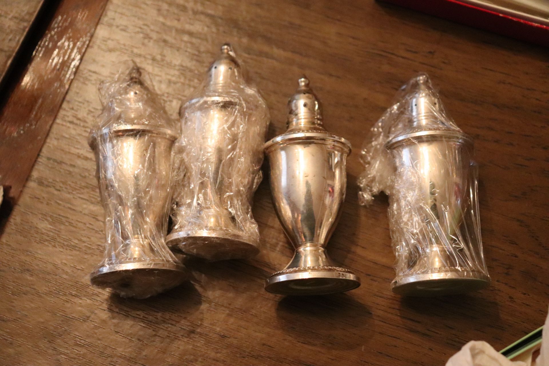 Group of weighted sterling salt and pepper shakers, approximate height 4-3/4"