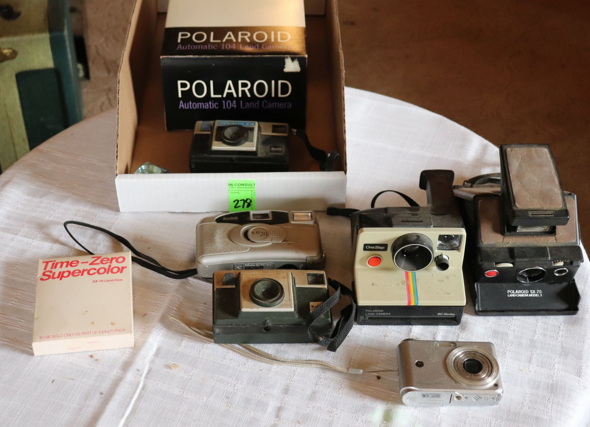 Polaroid and Kodak cameras