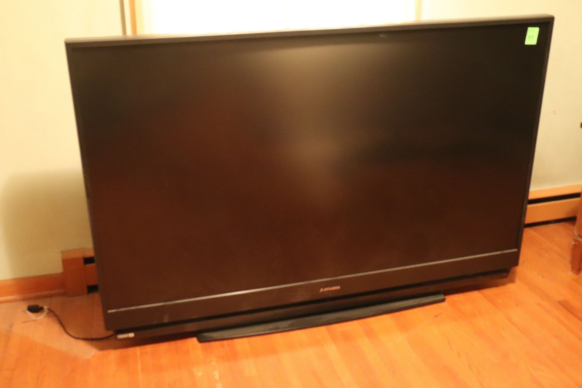 62" Mitsubishi flat screen television, 1080P