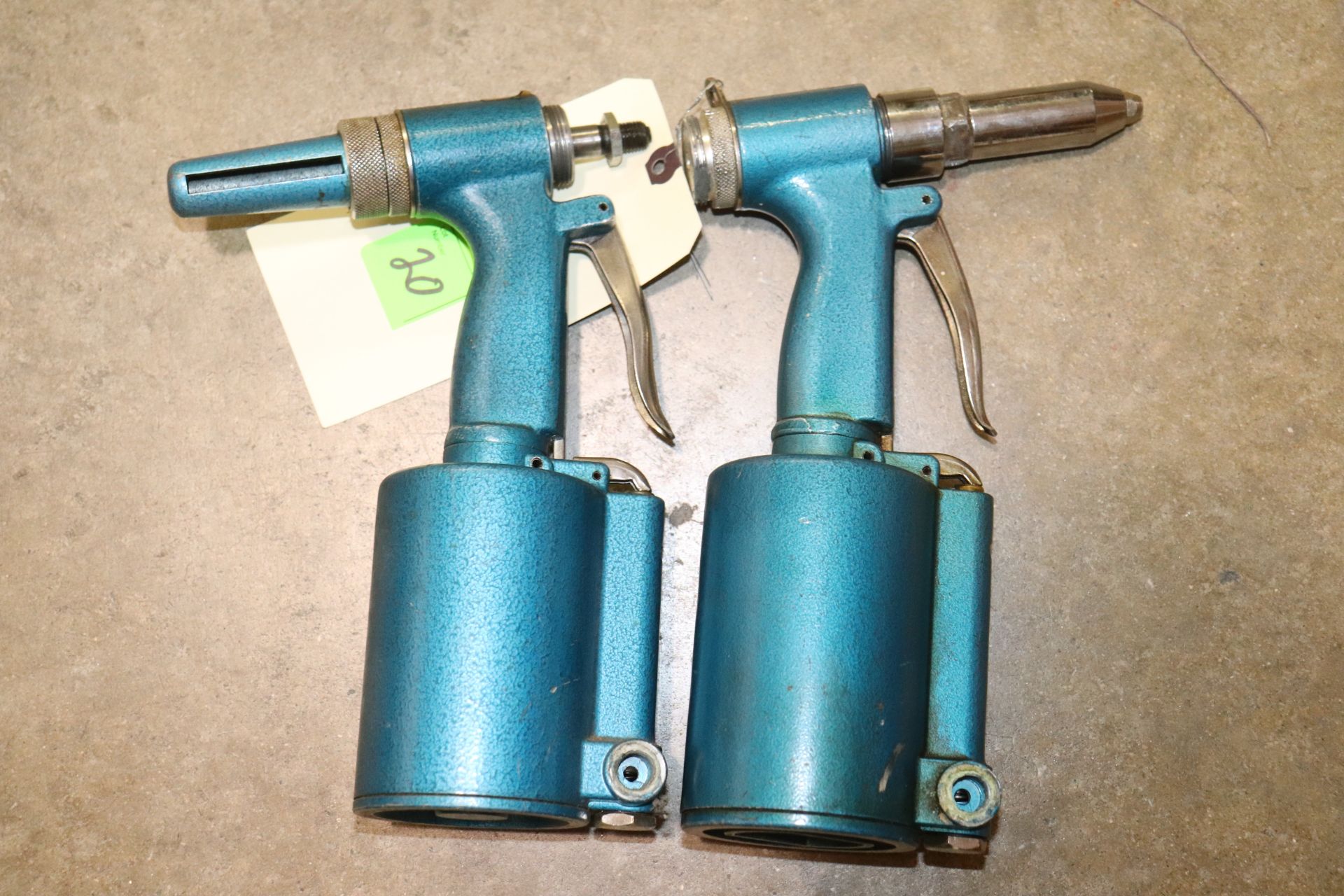 Two air hydraulic riveters