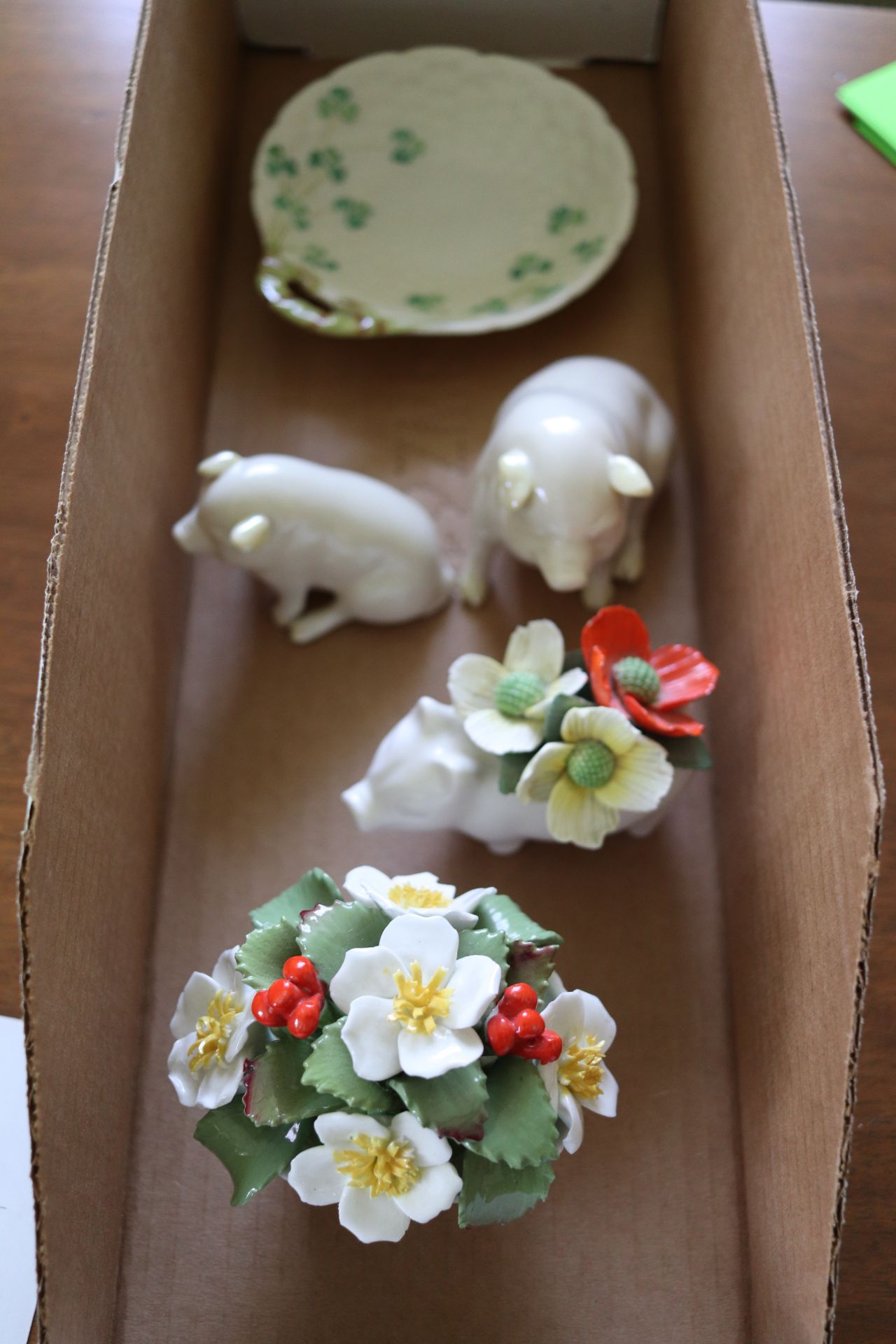 Aynsley pair of flowers, porcelain pigs by Belleek, and a dish by Belleek