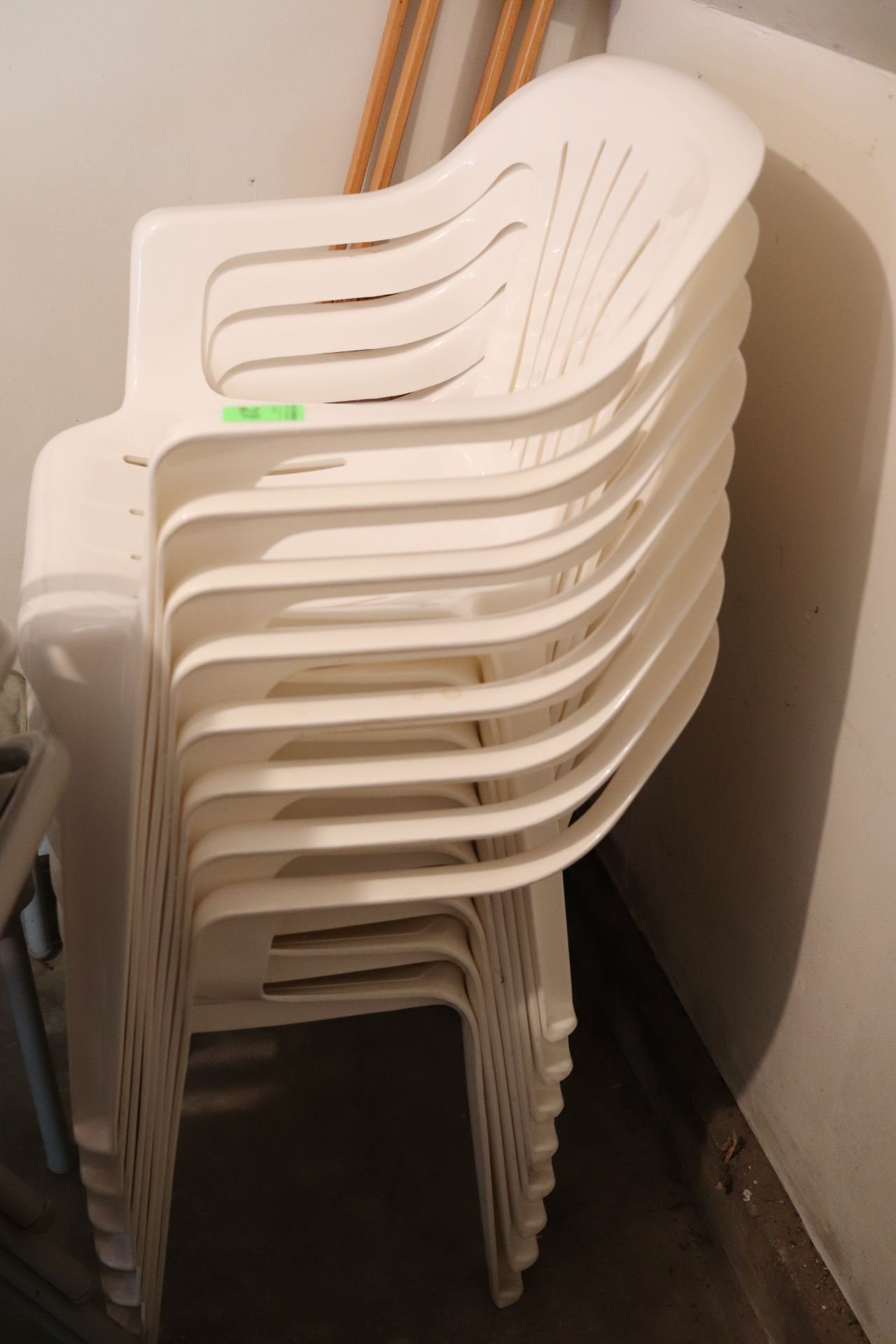 Nine plastic chairs