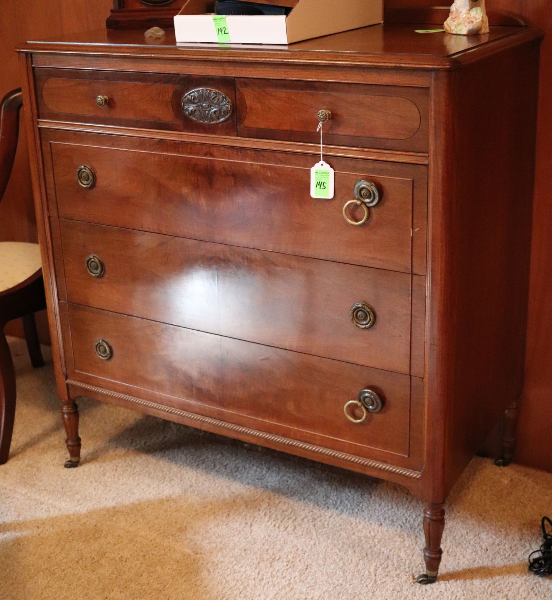 Early 20th Century mahogany finish dresser fitted with four drawers with brass pulls