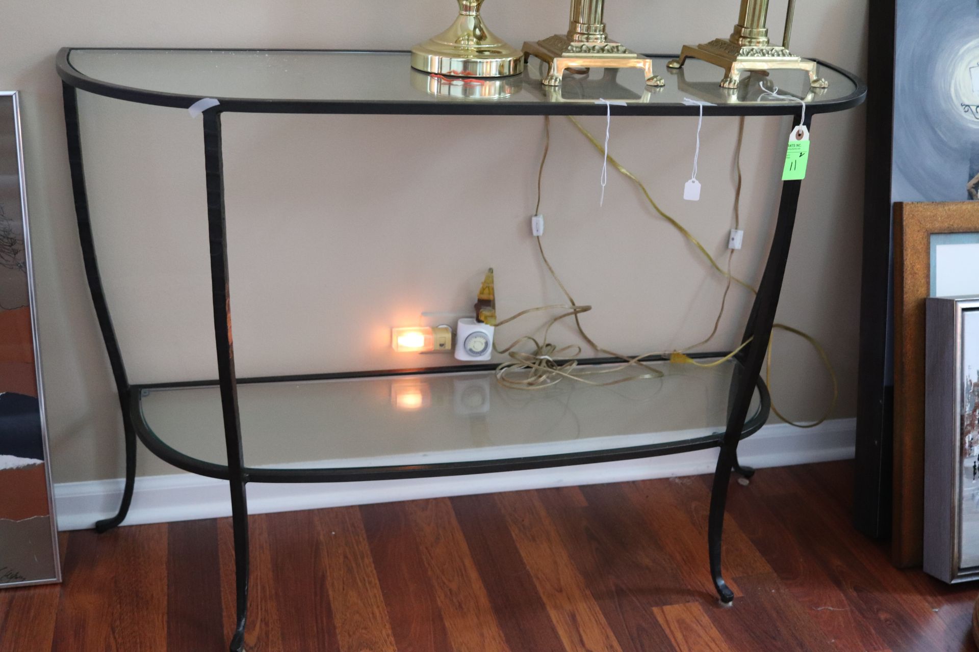 Contemporary glass top coffee table, rectangular glass top over lower glass shelf raised on four leg