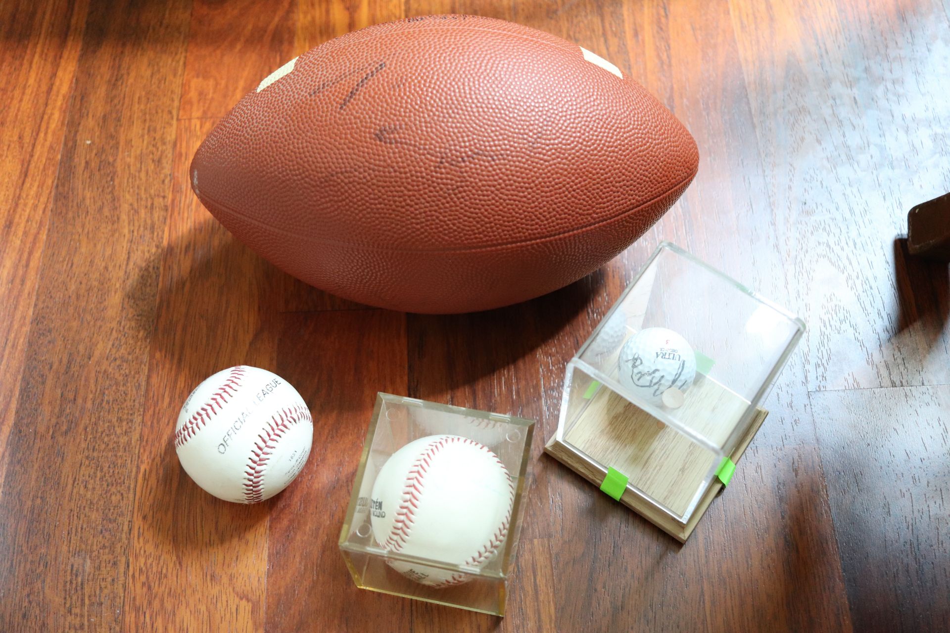Autographed baseball, Jack Buckner, autographed ultra #1 golf ball and autographed football