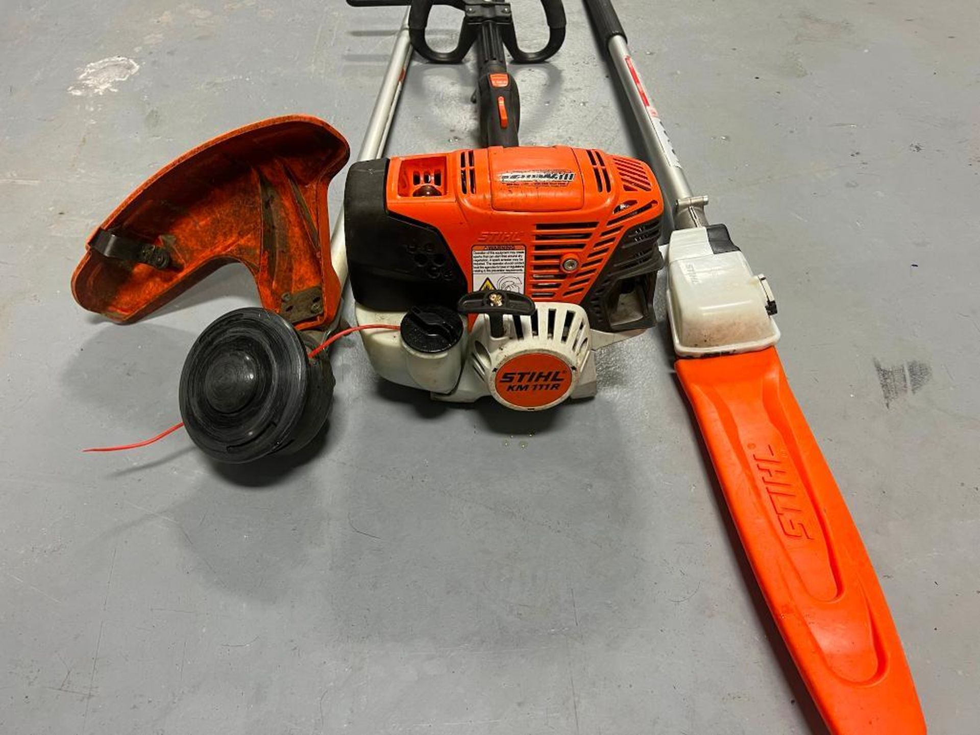 (1) Stihl KM111R with Line Head Trimmer Attachment & Long Reach Chainsaw. Located in Mt. Pleasant, I - Image 2 of 2