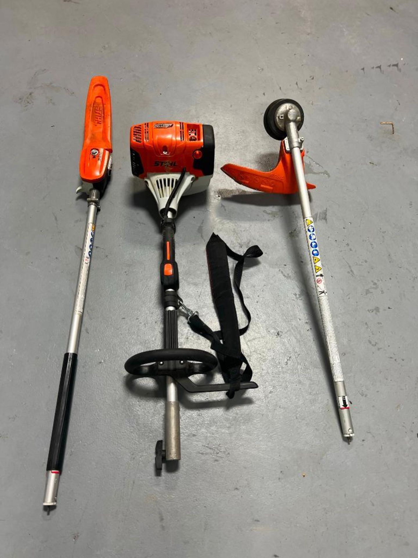 (1) Stihl KM131R with Line Head Trimmer Attachment & Long Reach Chainsaw. Located in Mt. Pleasant, I