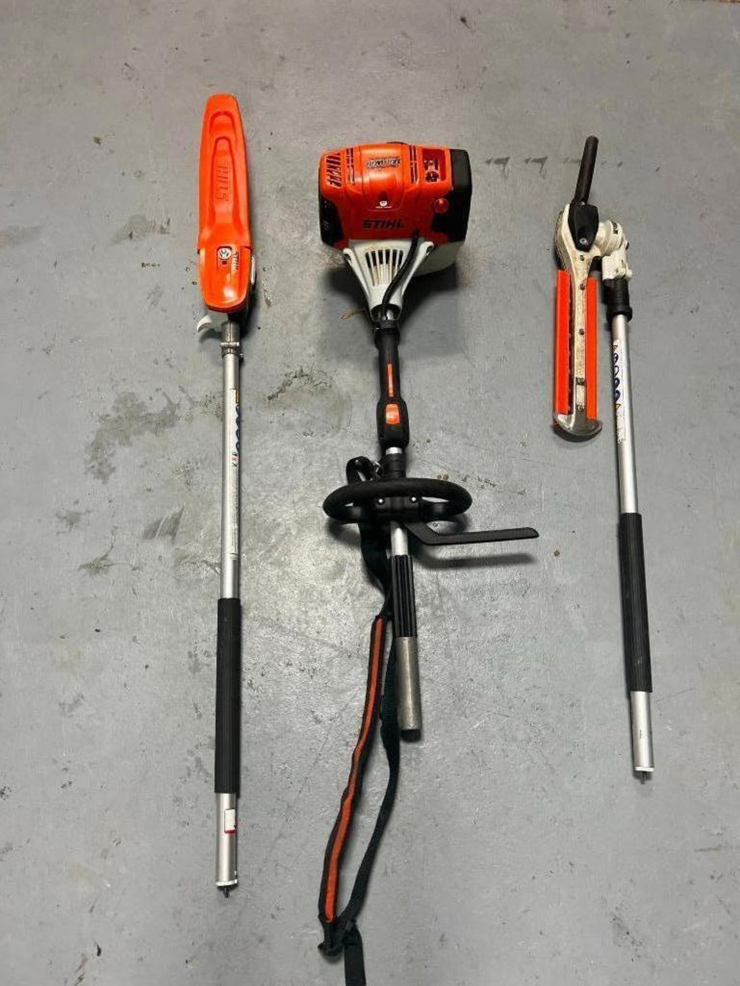 (1) Stihl KM131R with 145 Degree Adjustable Hedge Trimmer Attachment & Long Reach Chainsaw. Located