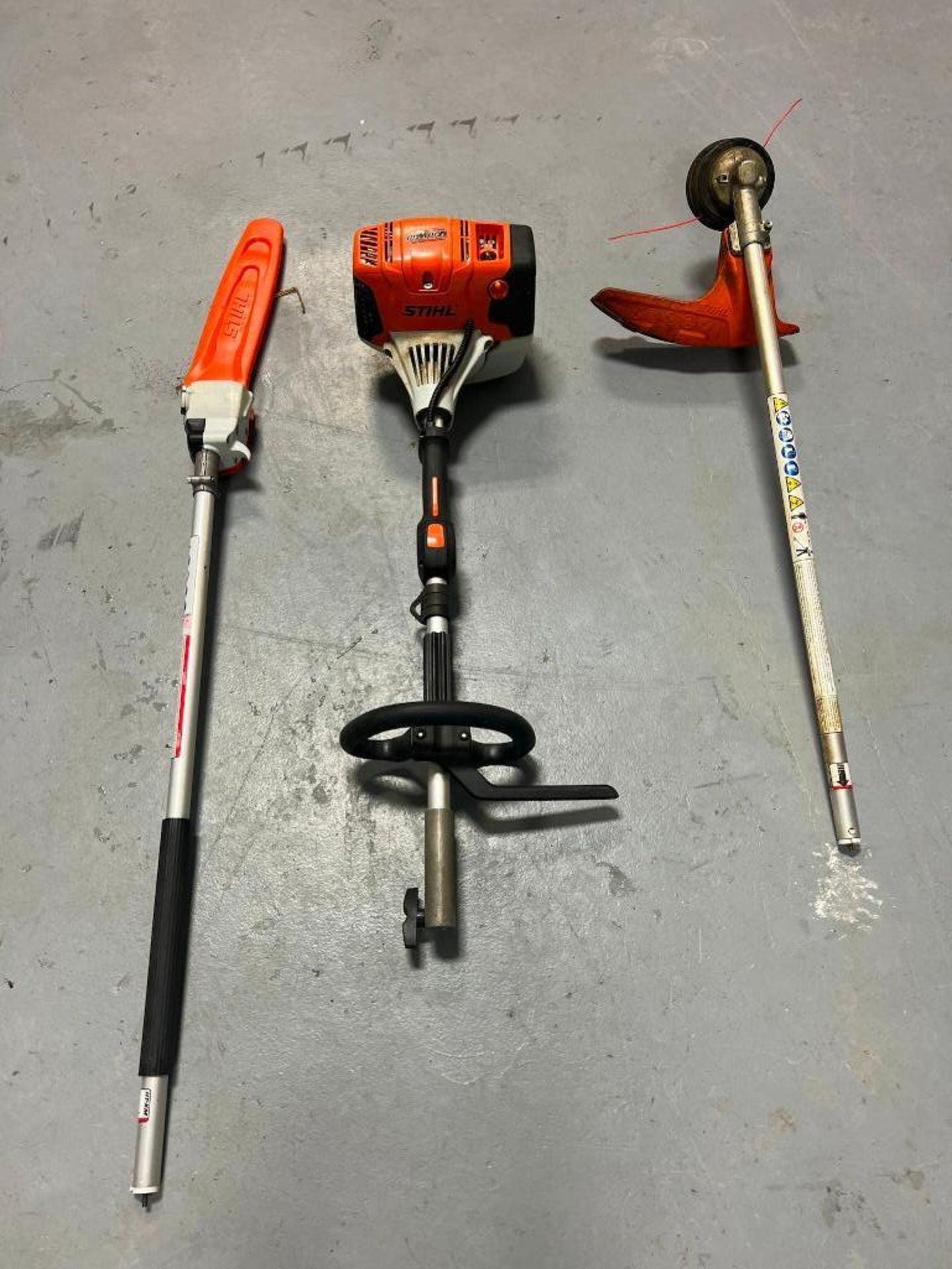 (1) Stihl KM111R with Line Head Trimmer Attachment & Long Reach Chainsaw. Located in Mt. Pleasant, I