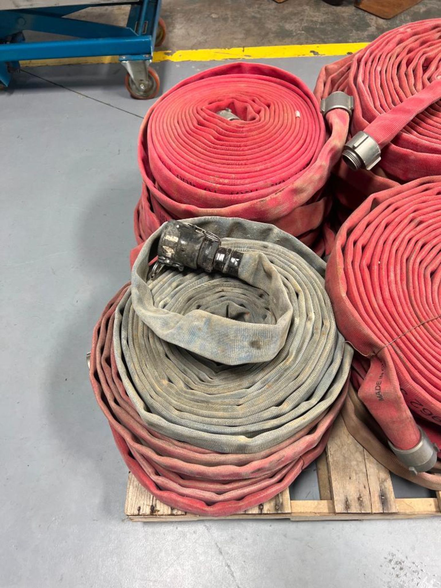 (9) 50' 1 3/4" Service Text 400 PSI Hose. Located in Mt. Pleasant, IA