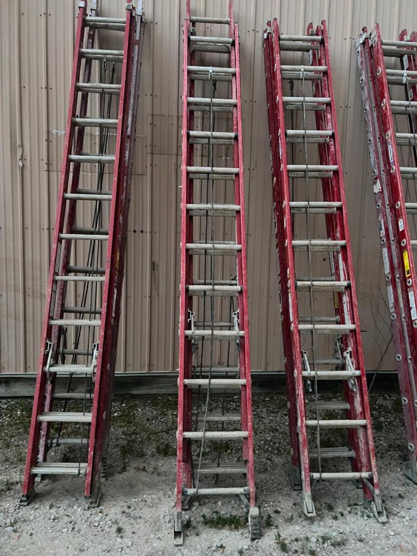 (2) 24' Werner Professional Extension Ladders, 300# Rated 1A. Located in Mt. Pleasant, IA