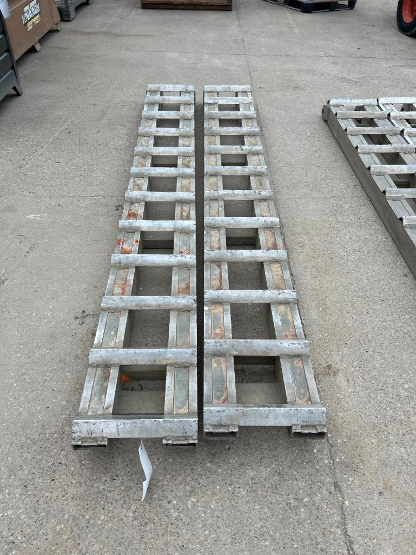 (2) 10' x 14" x 5" Aluminum Trailer Ramps. Located in Mt. Pleasant, IA