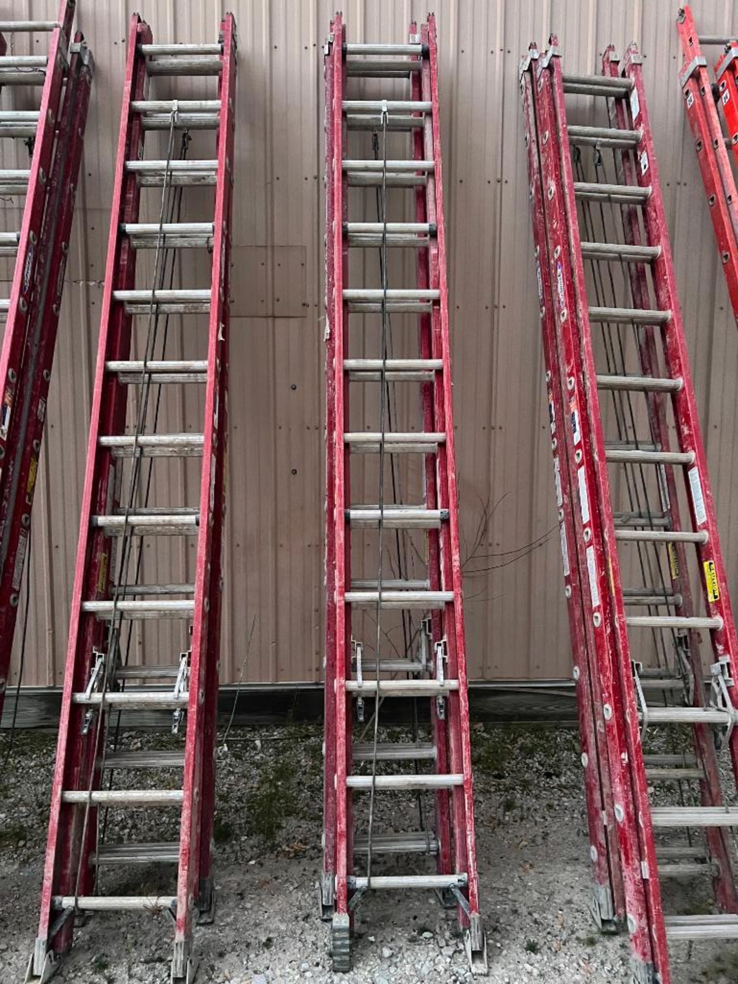 (2) 24' Werner Professional Extension Ladders, 300# Rated 1A. Located in Mt. Pleasant, IA