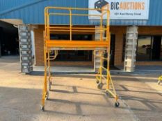 6' Bil-Jax Pro-Jax Utility Scaffold with casters, New Guard Rail Pkg. & New Outrigger. Located in Mt